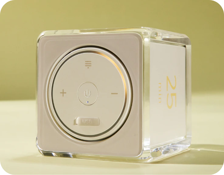 The underside controls and softly illuminated edge of Settledy